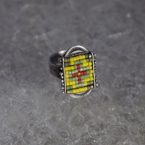 La Reina Cross Ring in Greens, Yellow, and Red