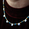 Glimmer of Gold Necklace with White Quartz